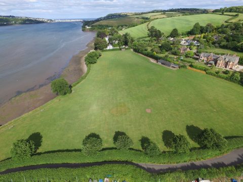 Aerial view of Hearn Field and the River Teign, looking towards the river mouth